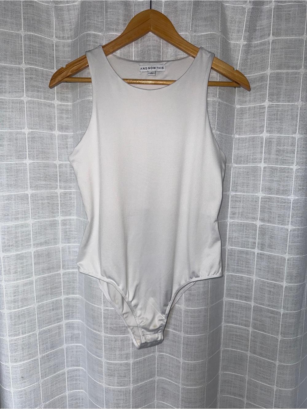 And Now This White Sleeveless Bodysuit